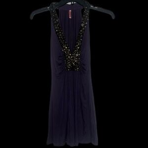 Elegant Purple Blouse with Gold Accent Beads